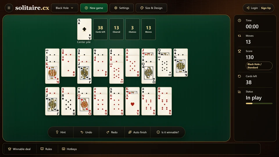 Black Hole Solitaire with an Ace on the center pile and exposed Kings and 2s available around the fans.