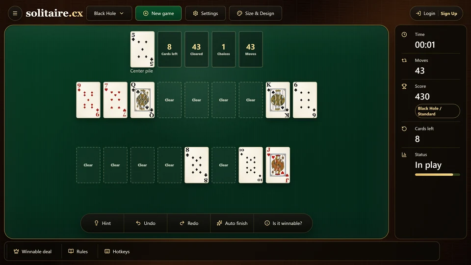 Late Black Hole Solitaire deal with most fans empty and a few exposed cards remaining around the center.