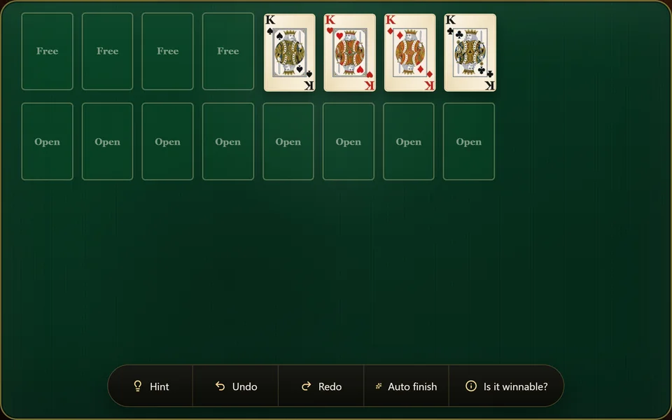 A finished FreeCell game with all 4 foundations built up to the King and the columns and free cells emptied.