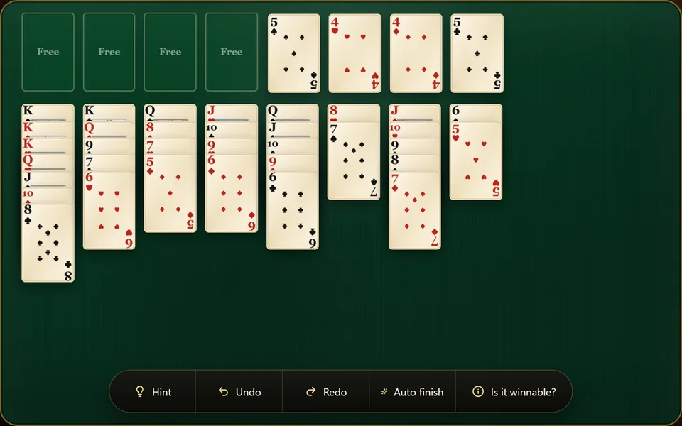 A FreeCell game part of the way through, with all 4 free cells still empty, each foundation started a few cards up its suit and the 8 columns partly sorted.