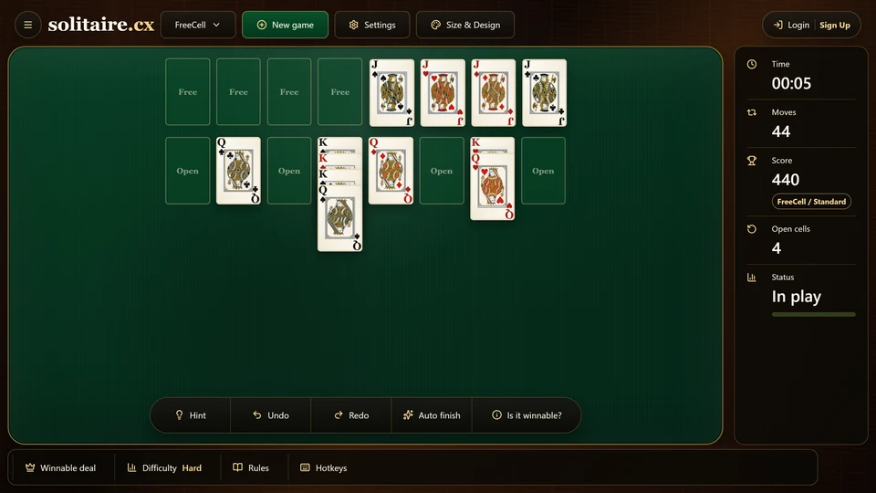 A late FreeCell position with several empty columns and the foundations close to completion.