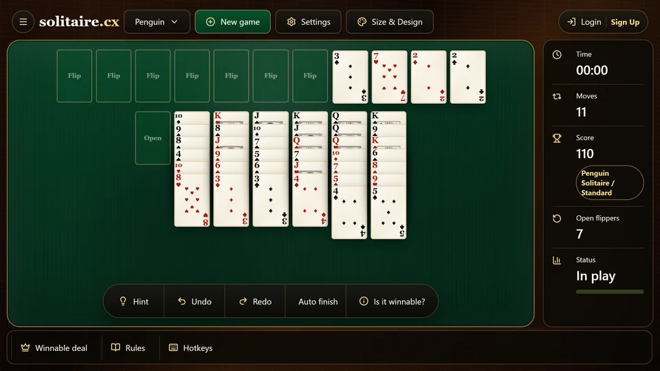 Penguin Solitaire in progress with foundations climbing from the beak rank and a wrapped same-suit tableau sequence.