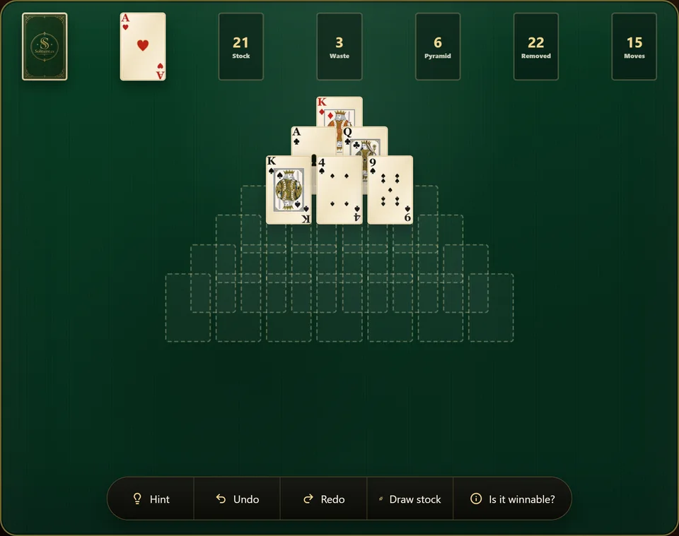 A Pyramid Solitaire game late in play, with most of the triangle removed and only a few cards left near the top of the pyramid.