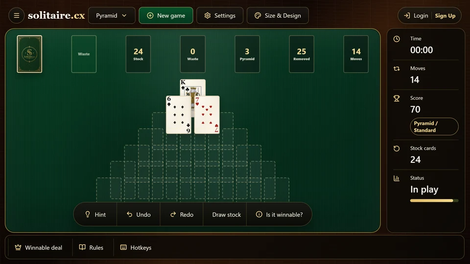 A late Pyramid Solitaire position with only a few exposed cards left before the table is cleared.