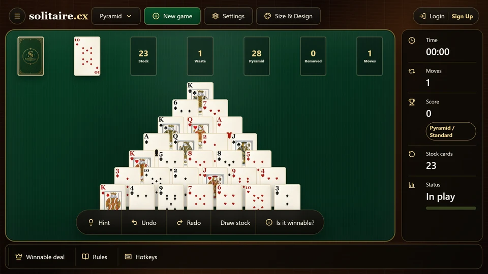 A Pyramid Solitaire table with a current waste card ready to be compared against all exposed pyramid cards before drawing again.