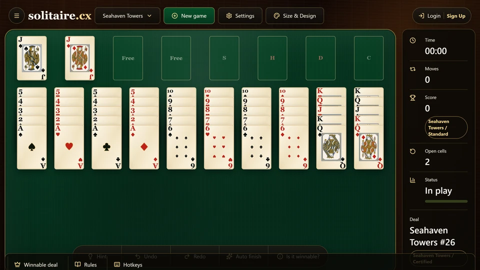 Seahaven Towers Solitaire board with 10 tableau towers, 4 foundations and 2 occupied reserve cells.