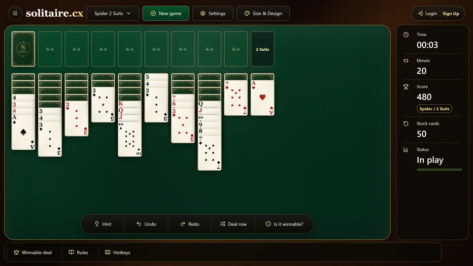 A Spider 2 Suits board immediately before a stock row, with every tableau column occupied.