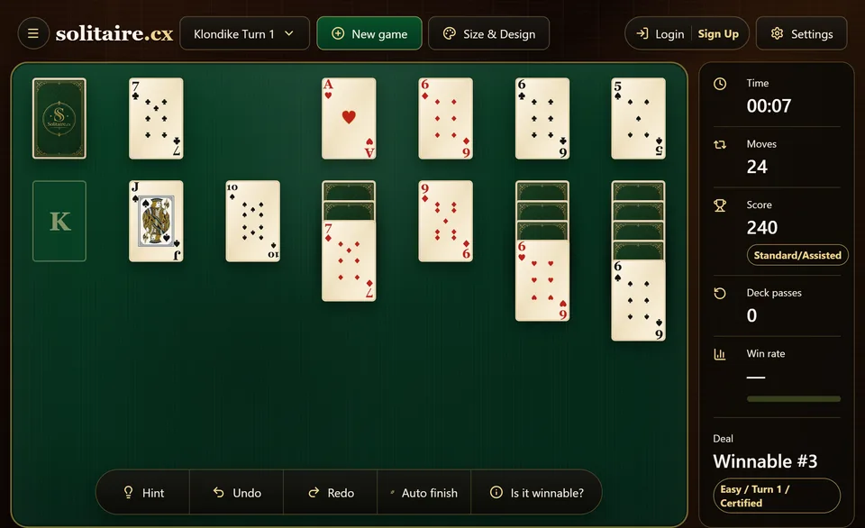 A Klondike game in progress with the foundations climbing together and a King settled in an empty column on the left.
